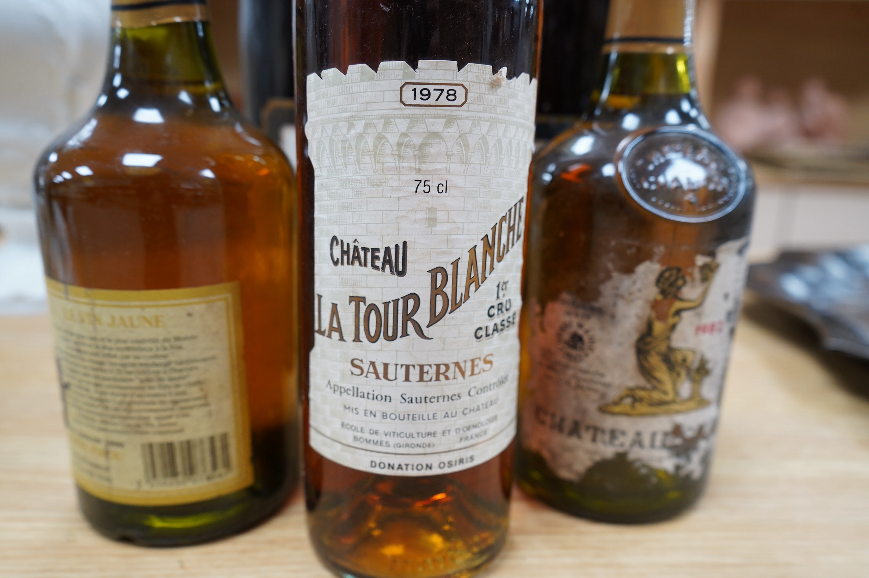 Wine: A bottle of Chateau Latour Blanche, Sauternes, Premiere Cru Classe 1978, a bottle of Chateau Chalon 1990, a bottle of Chateau Chalon 1982, a bottle of Donatien Bahuaud Red 1994, and a bottle of Donatien Bahuaud Whi